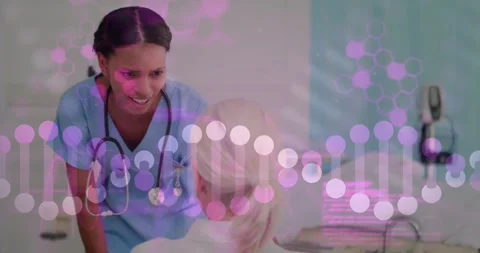 Nurse coming to bedside and leaning over patient for care, causing DNA helix Stock Footage 330380153