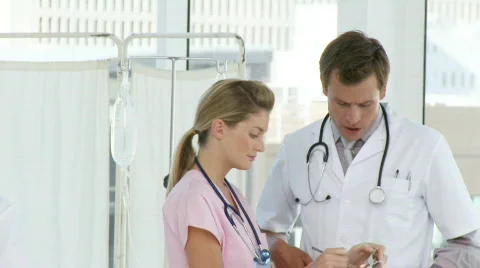 Nurse with a doctor Stock Footage