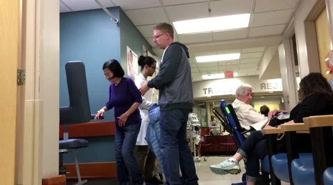 Nurse is drawing blood sample at ER inside Eagle ridge hospital Stock Footage 64928788