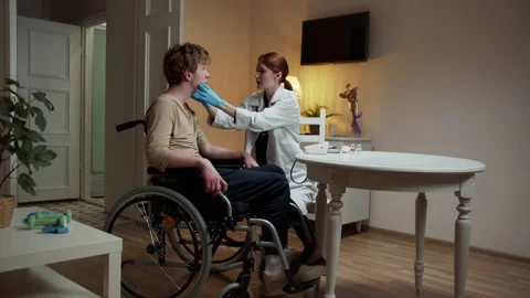 A nurse is examining the patient Stock Footage 163182575