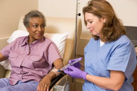 Nurse Giving Patient Injection Stock Photos