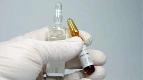 Nurse Hand Checking Vials Of Medicine's Expiration Date Discarding Them Stock Footage 47656120