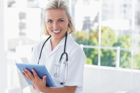 Nurse holding a tablet computer Stock Photos