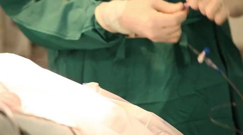 Nurse hooking up I.V., Close up on hands Vídeo Stock 55531551