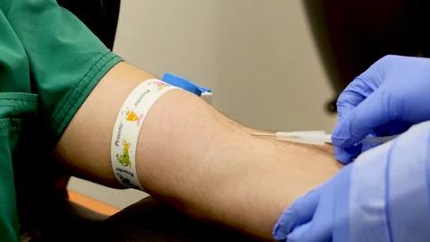 Nurse Inserts Needle Into Vein For Drip ... | Stock Video | Pond5