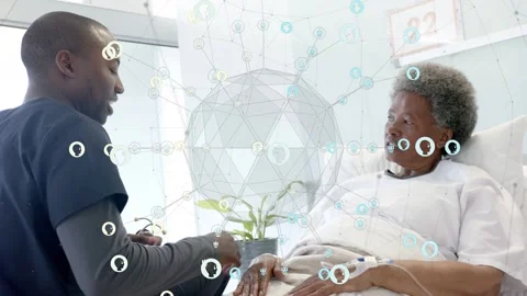 Nurse kneeling bed talking then reaching, adjusting leads while node overlay Video stock 334322224