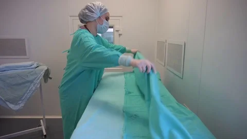 Nurse is making a medical bed Stock Footage