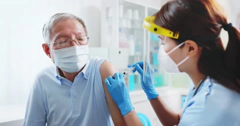 Nurse making a vaccination Stock Footage 146692858