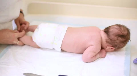 Nurse measure height, circumference head, chest of newborn baby. Stock Footage 68220135