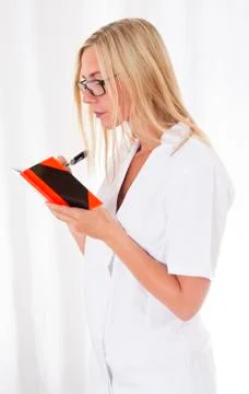 Nurse with notebook Stock Photos