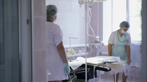 Nurse in the operating room Stock Footage 60798584