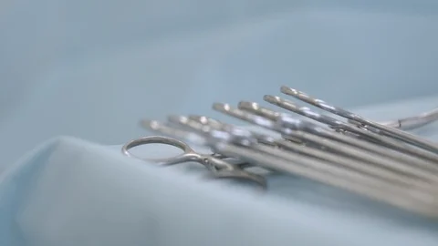 The nurse picks up the tools from the table 2 Stock Footage 101478558