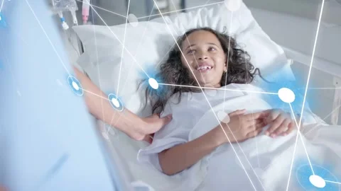Nurse placing hand on child in bed, initiating animated nodes overlay, enhancing Stock Footage 333670911