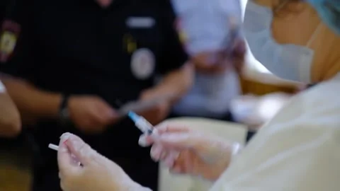 The nurse is preparing to give an injection Stock Footage 158140509