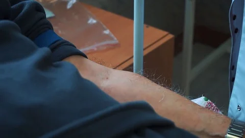 Nurse Put A Dropper To A Patient Arm In Hospital Room  Stock Footage 83876447