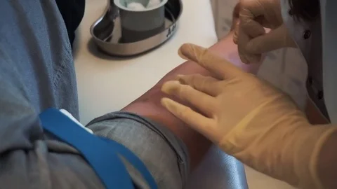 Nurse Put A Dropper To A Patient Arm In Hospital Room  Video stock 83876501
