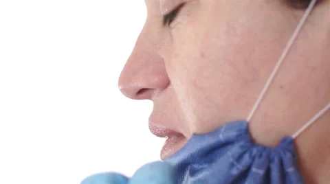 Nurse Puts On Mask Side View 스톡 동영상 44189168