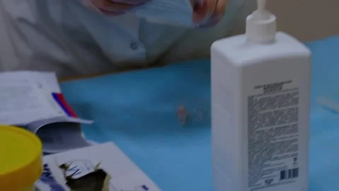 The nurse puts things in order at the workplace Stock Footage 158140777