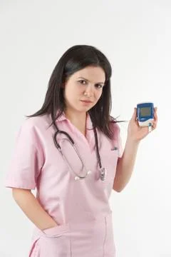 Nurse ready with stethoscope and glucometer Stockfoto's