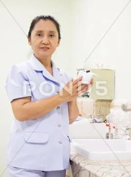 Nurse rub the hands dry Stock Photos