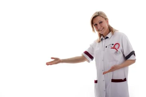 Nurse shows in empty space 스톡 사진