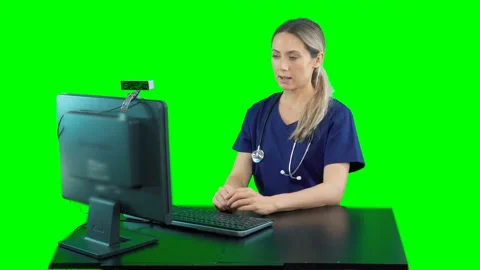 Nurse sitting in front of computer talking to patient. Telemedicine video chat Stock Footage 132001934