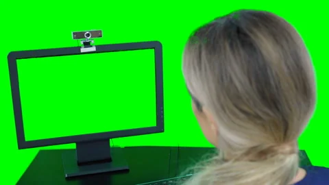 Nurse sitting in front of computer talking to patient. Telemedicine video chat Stock Footage 132013833