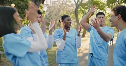Nurse, solidarity and hand stack with friends, outdoor and applause with excited Stock Footage 346122789