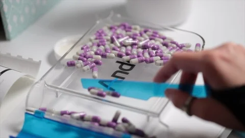 A Nurse Sorting Pills Stock Footage 127192723