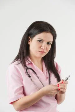 Nurse with stethoscope ready for injection Foto stock