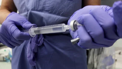 Nurse with syringe Stock Footage 239363826