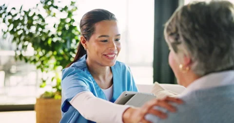 Nurse, tablet and talking to senior patient in nursing home with kindness, smile Stock Footage 339124906