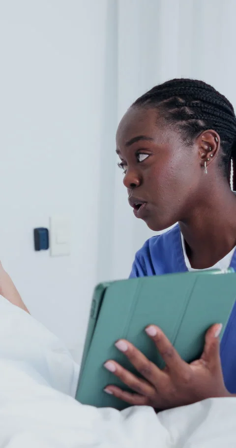 Nurse, tablet or talking with patient in hospital bed for medical checkup or Stock Footage 340898396