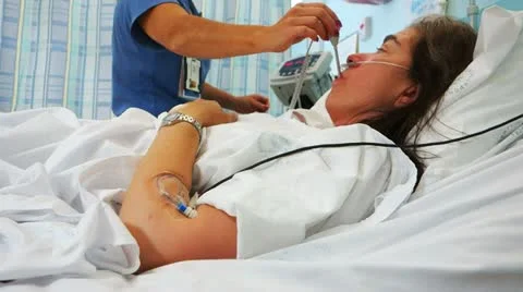 Nurse takes temperature Stock Footage 21261792