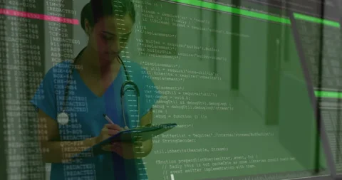 Nurse taking notes in medical wing starting green code overlay and smiling after Stock Footage 312098369