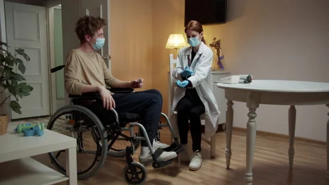 A nurse is talking with her patient Stock Footage 163183000