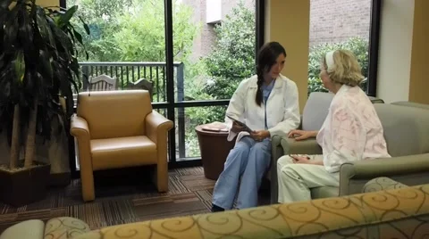 Nurse talking with patient Stock Footage 40763181