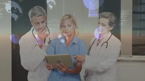 Nurse tapping tablet, doctors pointing, chart overlays appearing over group, Stock Footage 333830532