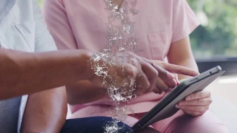 Nurse tapping tablet, man reaching guiding tapping, initiating data column Stock Footage 334768658