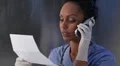 Nurse with test results. HD Footage
