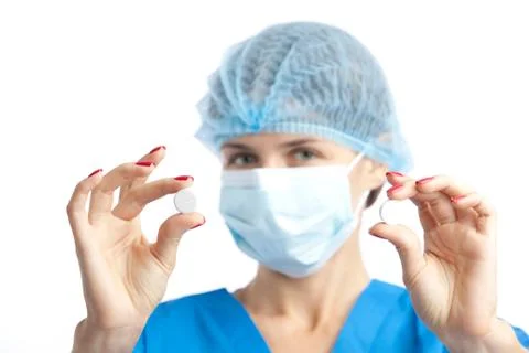 Nurse with two pills Stock Photos