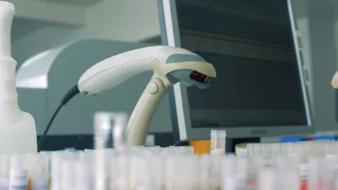 Nurse uses scanning machine scanning barcodes, close up. Stock Footage 91685306