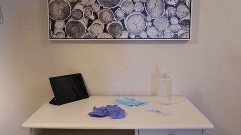 Nurse Using Smart Phone Then Sanitizing Hands During Coronavirus 스톡 동영상 126787312