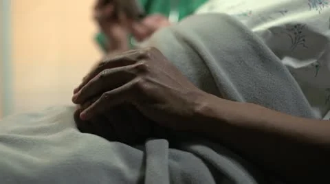 Nurse using a tablet to explain the African American patient's condition Stock Footage