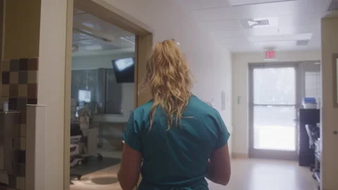 Nurse Walking To Operating Room Stock Footage 211881168