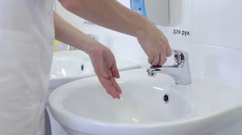 Nurse washing hands Stock Footage 58032345