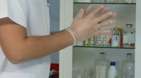 NURSE WEARING GLOVES Stock Footage 35847446