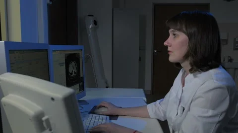 Nurse working on a CT scanner Stock Footage 97206822
