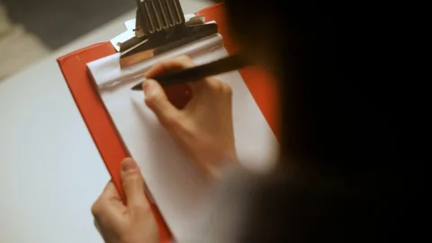 Nurse Writes on Red Block Stock Footage 92548436