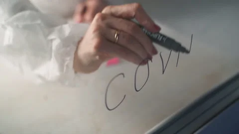 Nurse Writes Text Covid-19 From Ward Window in Hospital. Coronavirus Outbreak. Stock-Footage 138601908